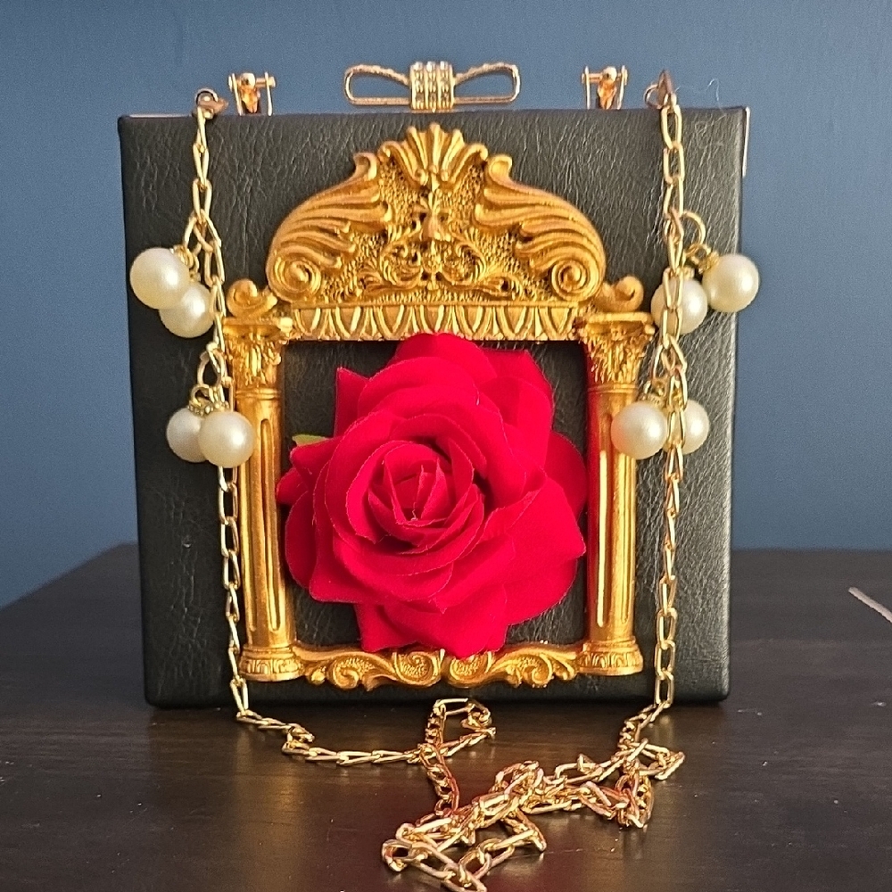 Elegant Black and Gold Clutch with Red Rose